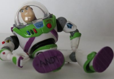 buzz lightyear with andy on foot