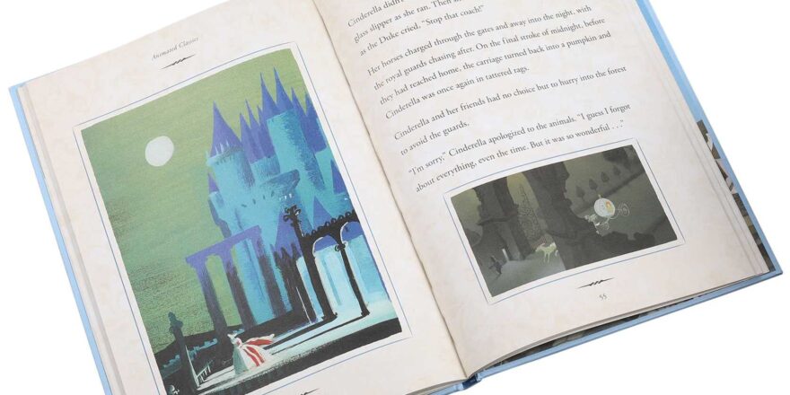 An open book, showing Cinderella running away from the castle, and a carriage speeding away in the second image. It also shows large print text.