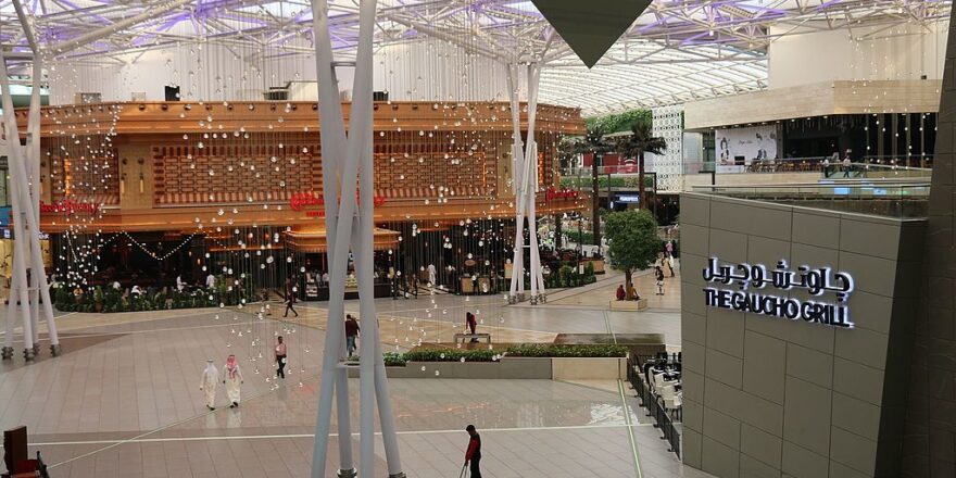 Interior of The Avenues shopping centre, Kuwait. Looking out over a large, enclosed plaza.