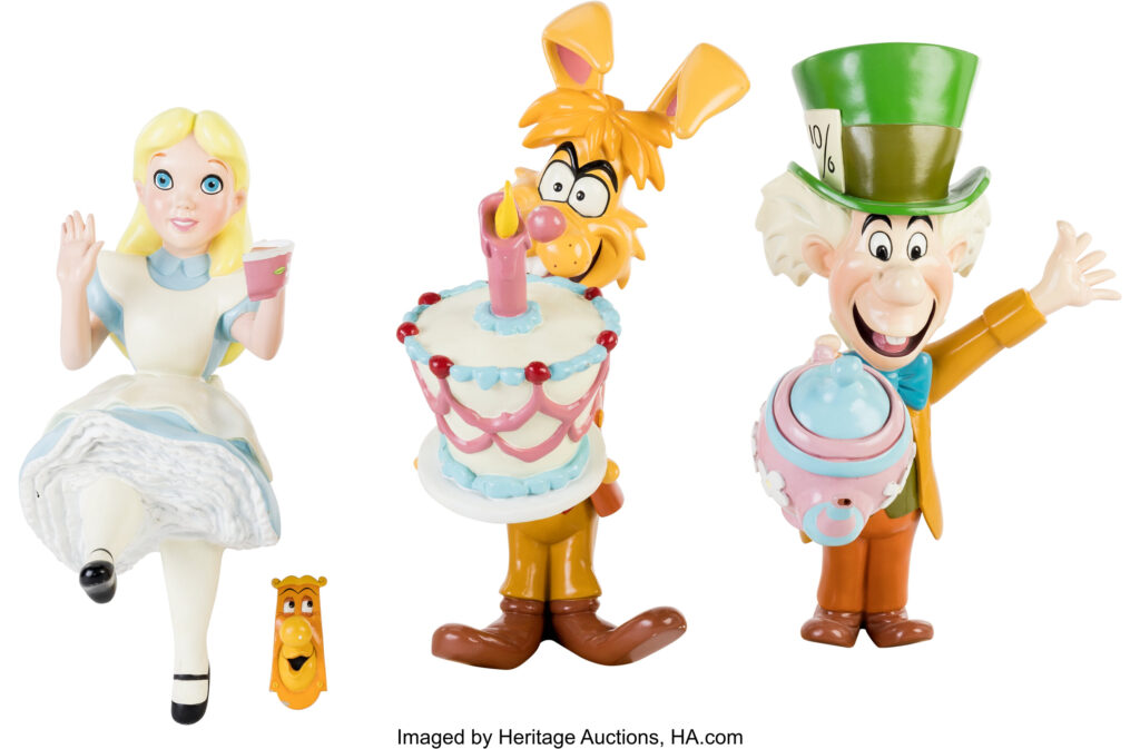 Alice, a doorknob, the March Hare, and the Mad Hatter.
