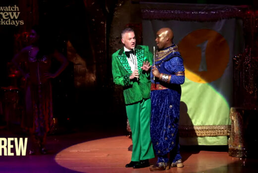 Two men in colourful suits, Ross Mathews and Michael James Scott.