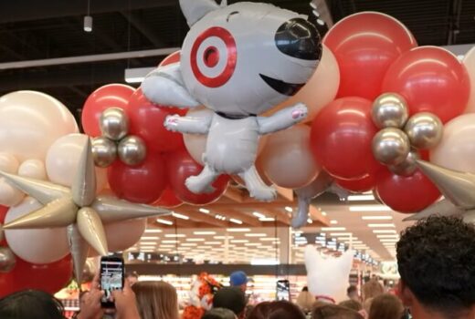 A balloon arch of red and white, with a Target bulldog at the top.