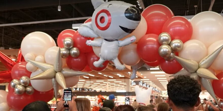A balloon arch of red and white, with a Target bulldog at the top.