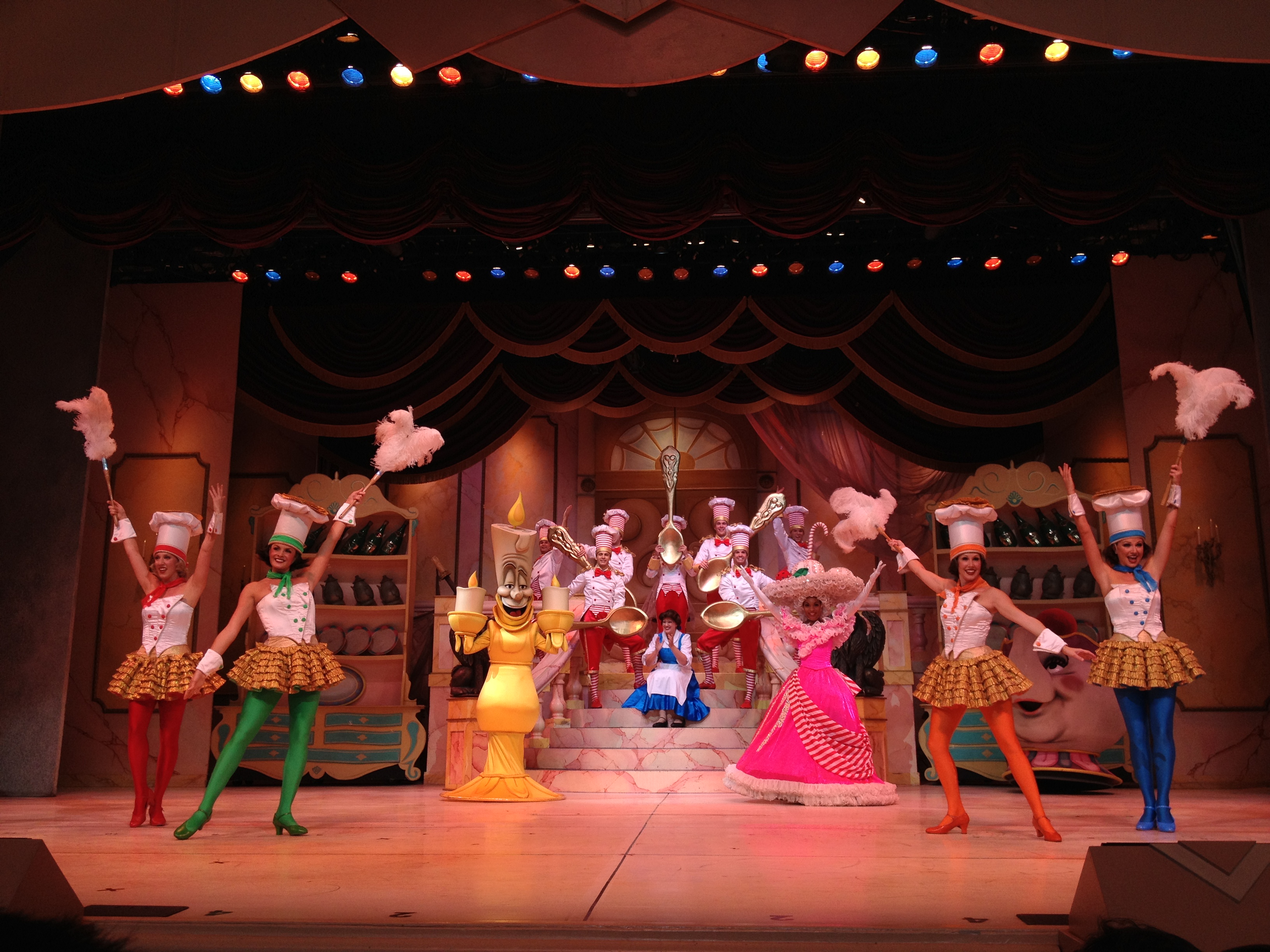 People cavort on stage.