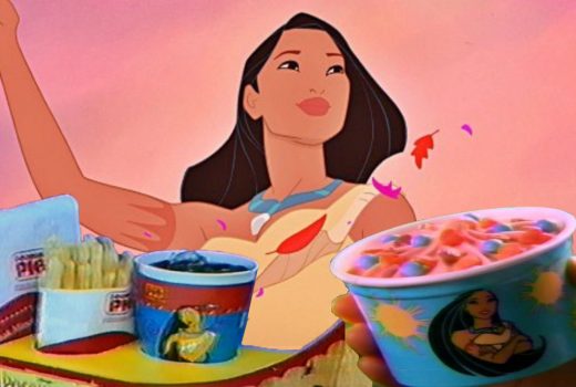 A woman waves, behind a fast food kids meal in a canoe, and a cup of ice cream with candies on top.