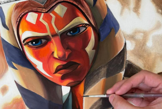 A painting of Ahsoka Tano, who has an orange face, and white and blue side piece.