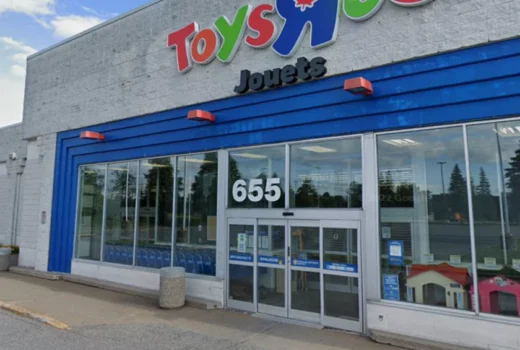 Exterior of a store reading Toys R Us Jouets.