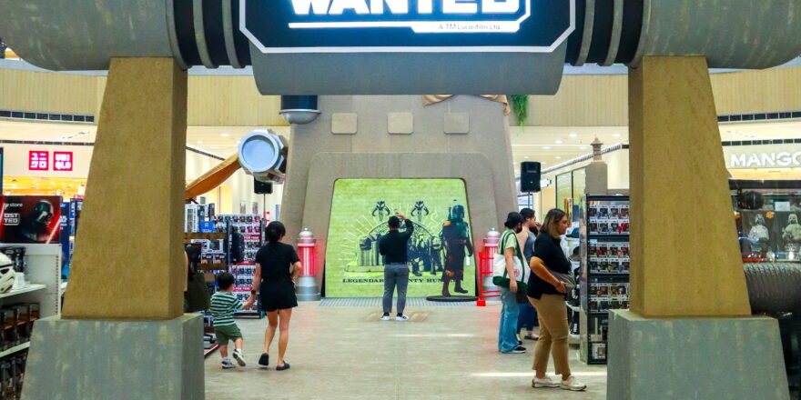A very structural arch way reading Star Wars Most Wanted, in front of a pop-up shop in a mall.