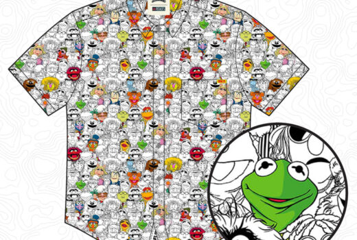 A collared shirt with cartoon faces as a pattern. Muppet characters appear. In a circle, Kermit the Frog is enlarged.